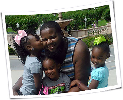 Photo of Davionne and his children.